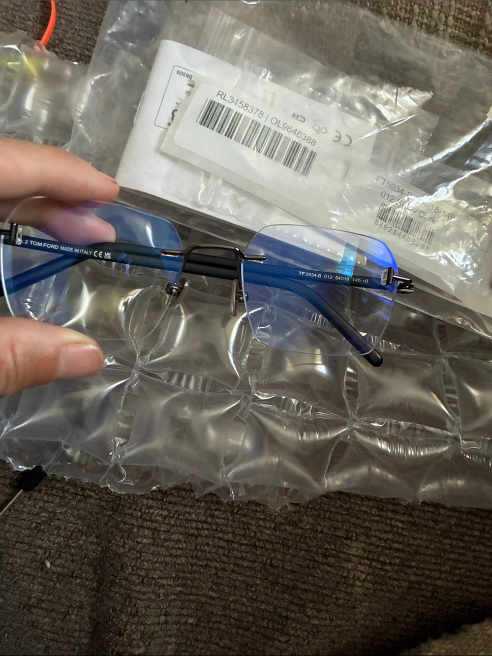 Tom Ford Blue Rimless with blue block lense  with Black Bridge